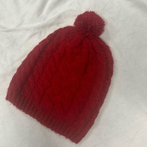 Women’s red knit hat.
